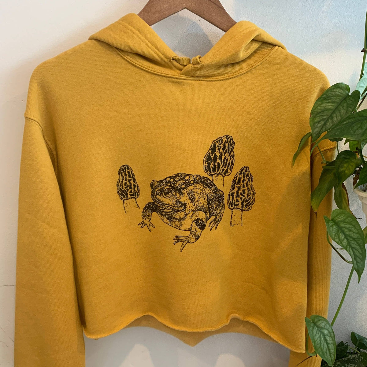 Cropped mustard hoodie with toad and morel mushrooms